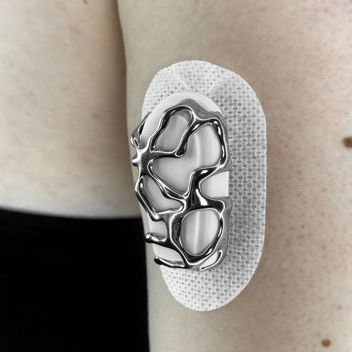 Silver Venom Armour for Dexcom G6, worn on the body