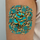 Cyan Venom CGM patch with a gold finish for Dexcom G7