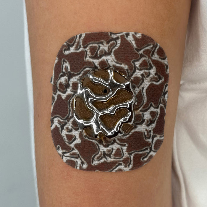 Brown Venom Patch on body