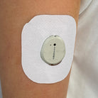 White Everyday CGM patch for Dexcom G7, worn on the body