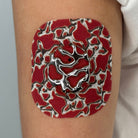 Red Venom CGM patch with a silver finish for Dexcom G7