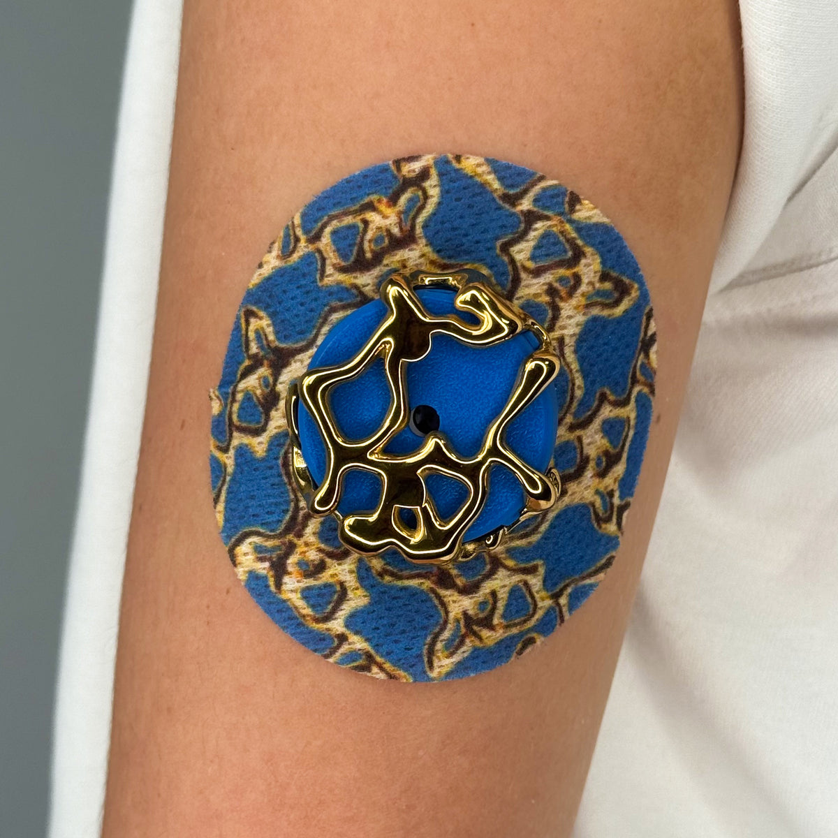 Blue Venom CGM patch with a gold finish for Libre 2