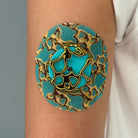 Cyan Venom CGM patch with a gold finish for Libre 2