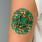 Green Venom CGM patch with a gold finish for Libre 2