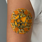 Yellow Venom CGM patch with a gold finish for Libre 2