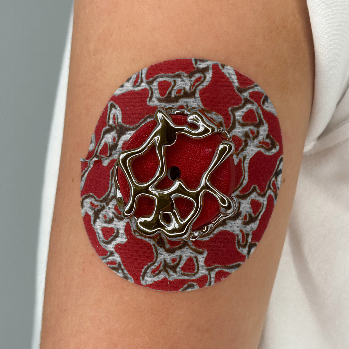 Red Venom CGM patch with a silver finish for Libre 2