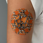 Orange Venom CGM patch with a silver finish for Libre 2