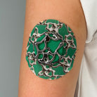 Green Venom CGM patch with a silver finish for Libre 2