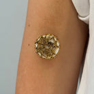 Gold Webbed Armour for Libre 3, worn on the arm