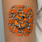 Orange Venom CGM patch with a silver finish for Dexcom G7